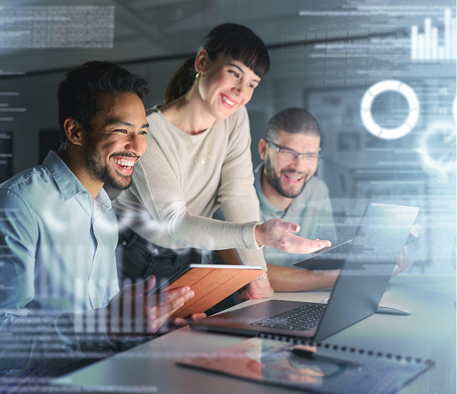 people working around a computer